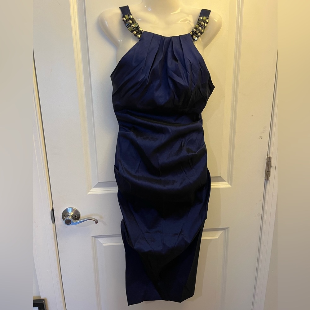 Navy blue dress with sheen, body hugging with cinching